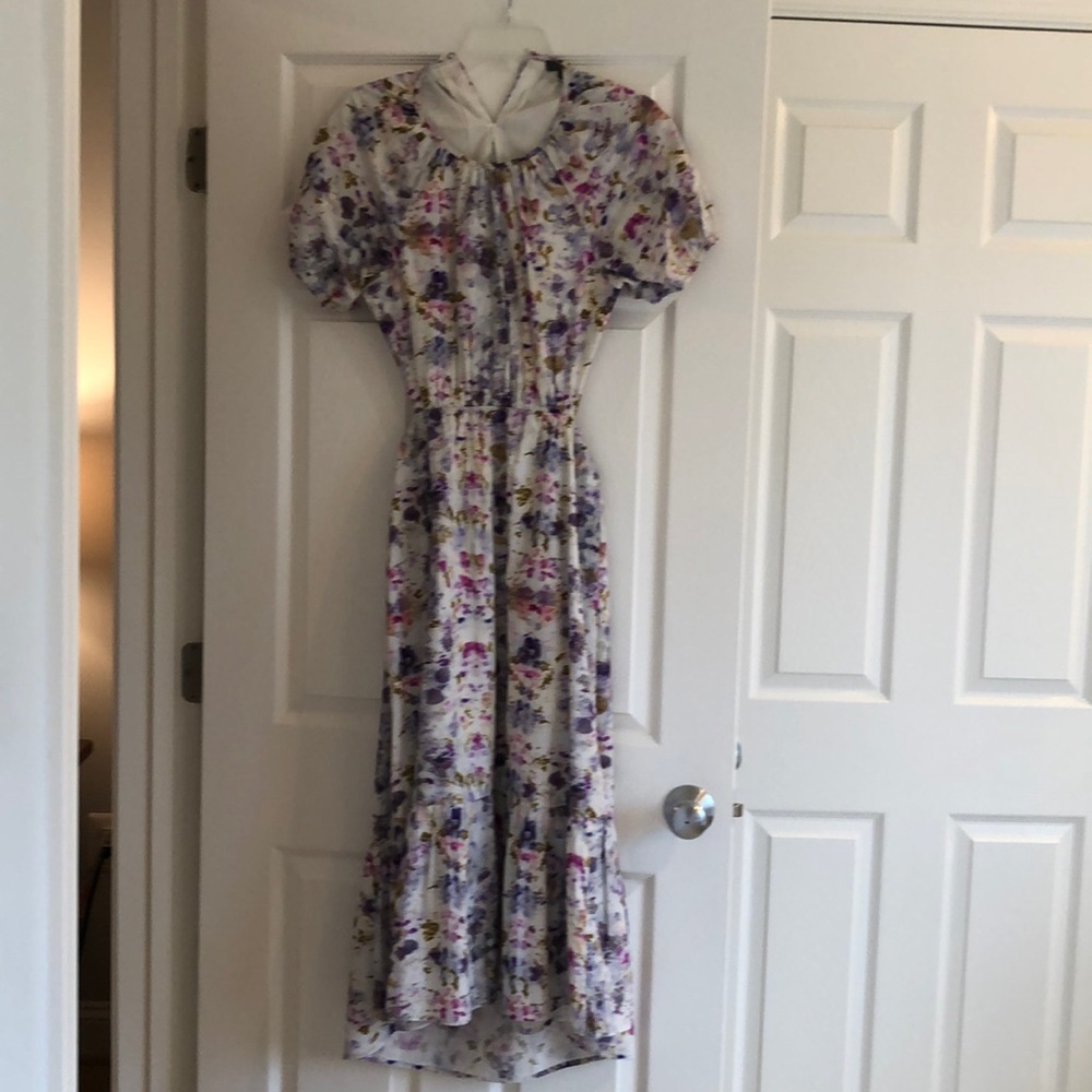 Floral midi dress with side cut outs.